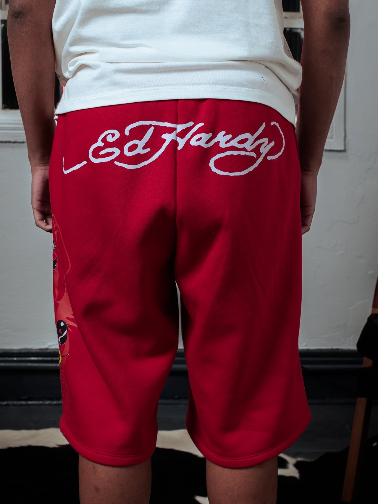 Bermuda de Moletom Vermelha "Winner Take All" Ed Hardy & 1OF1 Exclusivist